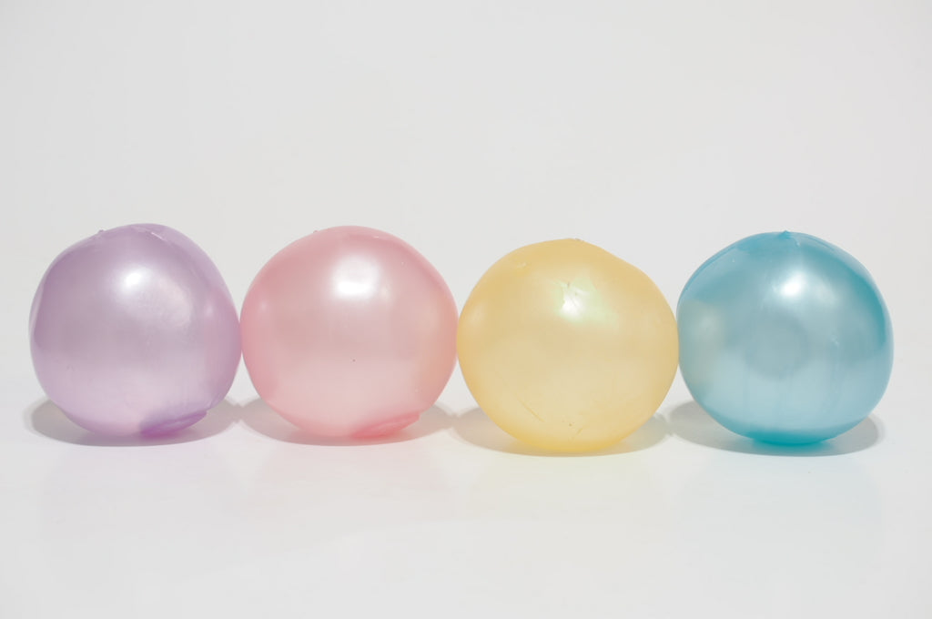 color-ball-oil-squishy-four-pastel-colors-group-display